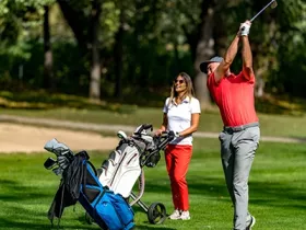 Couple Golfing