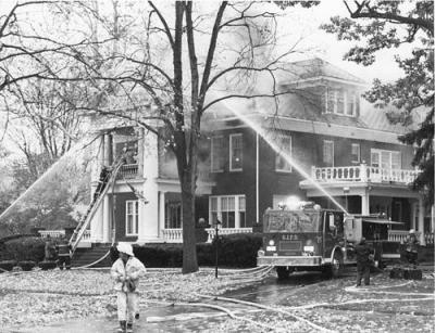 Fire fighters working on the fire at 506 S Oakland ST